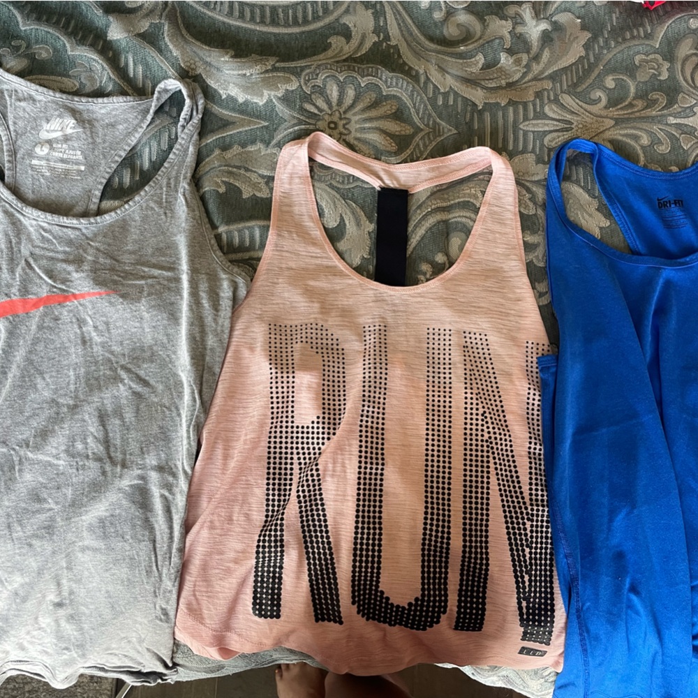 Nike RUN Tank Top in Pink